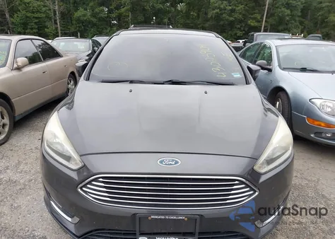 2015 Ford Focus Titanium from USA, damaged, VIN 1FADP3N21FL322359